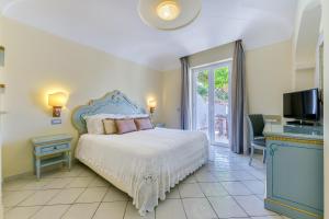 Ένα ή περισσότερα κρεβάτια σε δωμάτιο στο Villa Formica, a due passi dal mare +34 φωτογραφίες