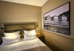 Una cama o camas en una habitación de Auszeit Hotel Hamburg
