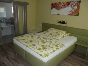 Posteľ alebo postele v izbe v ubytovaní Hotel Olga