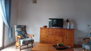 Et tv og/eller underholdning på Apartamentos Turísticos San Cristóbal by Bossh! Hotels