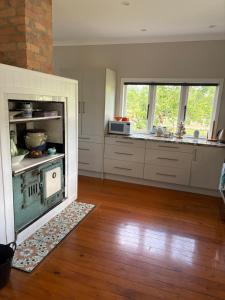 Køkken eller tekøkken på Pakiri Farm cottage + 13 billeder