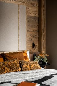 Un pat sau paturi într-o cameră la Villa Vita Krupówki