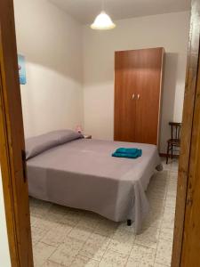 Ένα ή περισσότερα κρεβάτια σε δωμάτιο στο Maluma