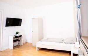 TV a/nebo společenská místnost v ubytování BEGE APARTMENTS StillSpace