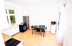 Kuchyň nebo kuchyňský kout v ubytování BEGE APARTMENTS StillSpace + 10 fotografií