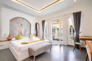 Ένα ή περισσότερα κρεβάτια σε δωμάτιο στο Azure Suites, Tibubeneng, Canggu +52 φωτογραφίες