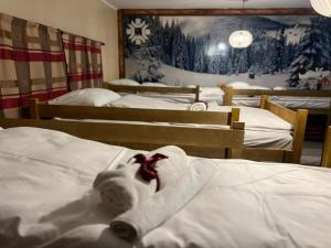 En eller flere senge i et værelse på Sarajevski begluk