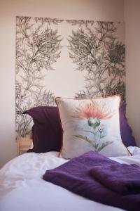 Ένα ή περισσότερα κρεβάτια σε δωμάτιο στο Loch Lomond Apartment +15 φωτογραφίες