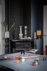 a room with a table with a group of scissors at Room in exclusive villa in sentral Oslo in Oslo +35 photos