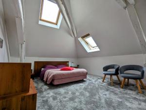 Ένα ή περισσότερα κρεβάτια σε δωμάτιο στο Château Raoul