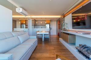 Χώρος καθιστικού στο Apartamento com jacuzzi no centro de Gramado