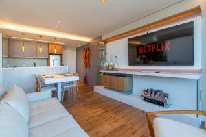 Χώρος καθιστικού στο Apartamento com jacuzzi no centro de Gramado