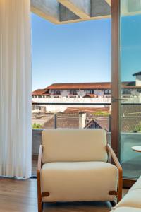 Μπαλκόνι ή βεράντα στο Apartamento com jacuzzi no centro de Gramado +62 φωτογραφίες