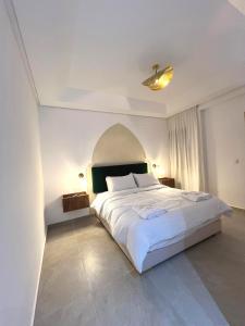 Кровать или кровати в номере Dar Fatma Suite Atlas Moroccan Charm near Agadir