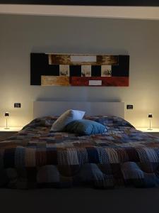 Una cama o camas en una habitación de Arlecchino Apartment di Manenti Andrea 13 fotos más