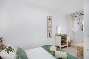 Кровать или кровати в номере Palo Cortado 16