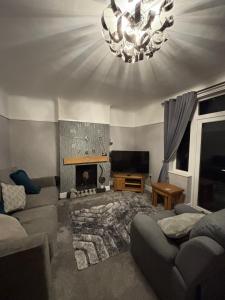 Et opholdsområde på 3 Double Room House, Parking, Facilities