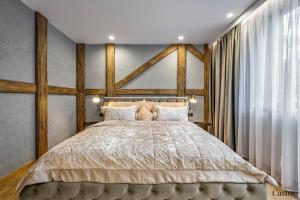 Postel nebo postele na pokoji v ubytování Chamois Apartments + 47 fotografií