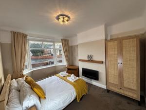 En eller flere senge i et værelse på 3 Double Room House, Parking, Facilities