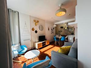 Μια τηλεόραση ή/και κέντρο ψυχαγωγίας στο Apartamentos Bluettravel Snow Confort Monte Gorbea