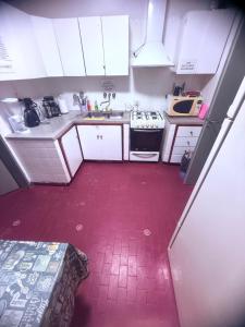 Køkken eller tekøkken på OLO Hostel & Bar Club VIEDMA