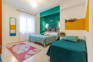 Ένα ή περισσότερα κρεβάτια σε δωμάτιο στο Casa Anita-relax e comodità