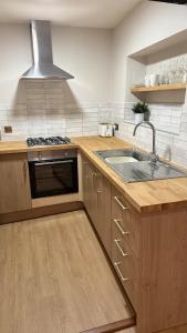 Køkken eller tekøkken på Victoria Boutique Apartment + 20 billeder