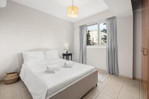 Кровать или кровати в номере Downtown Stadium 3 Bedroom Apartment