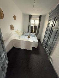 Ένα ή περισσότερα κρεβάτια σε δωμάτιο στο Ferienwohnung ab sofort