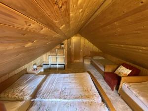 Postel nebo postele na pokoji v ubytování Kalchbauer Hütte