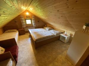 Postel nebo postele na pokoji v ubytování Kalchbauer Hütte