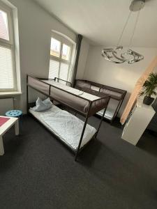 Ένα ή περισσότερα κρεβάτια σε δωμάτιο στο Ferienwohnung ab sofort +7 φωτογραφίες