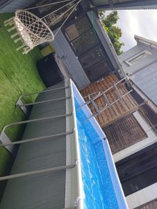 an overhead view of a house with a swimming pool at kaz'manou in Saint-Benoît +5 photos