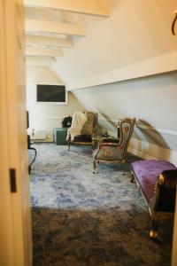 TV a/nebo společenská místnost v ubytování TheLodge