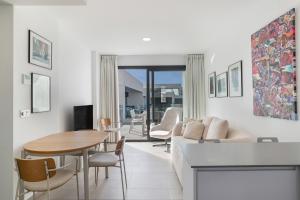 TV a/nebo společenská místnost v ubytování Casa África