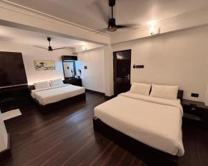 Postel nebo postele na pokoji v ubytování Luxe Style Hotels + 10 fotografií