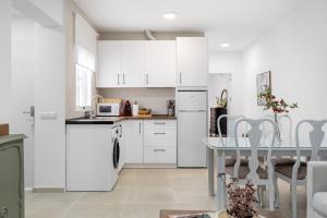 Кухня или мини-кухня в Palo Cortado 16
