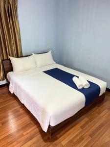 Ένα ή περισσότερα κρεβάτια σε δωμάτιο στο Koh Yao unnrak Resort