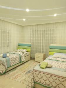 Кровать или кровати в номере Luxury Villa with Private Pool & Terrace in Belek