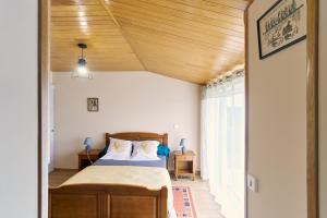 Ένα ή περισσότερα κρεβάτια σε δωμάτιο στο Gite Des 3 Étangs