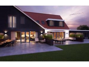 a rendering of a house with a patio at Modern villa in De Cocksdorp near the beach in De Cocksdorp