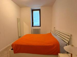 En eller flere senge i et værelse på The Home of Sun - Apartments in Villa