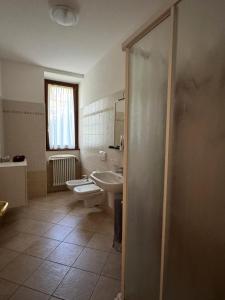 Et badeværelse på The Home of Sun - Apartments in Villa