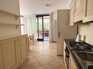 Køkken eller tekøkken på The Home of Sun - Apartments in Villa + 25 billeder