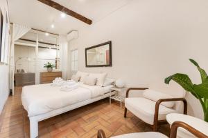 En eller flere senge i et værelse på Leonina Art House