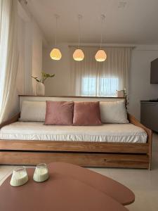 a bedroom with a large bed with two pillows at Capibara 6 - Vistas de Junin in Corrientes