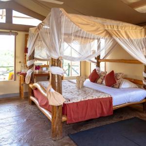 Postel nebo postele na pokoji v ubytování Maneaters