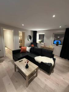 Et opholdsområde på Ågotnes Cozy Apartment