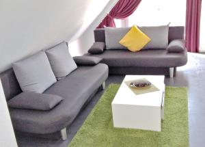 Posezení v ubytování Murthum Gästeappartments