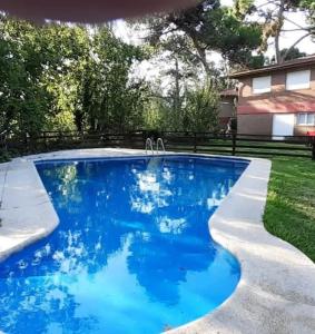 Swimmingpoolen hos eller tæt på Duplex N 22 prop Directo en Complejo